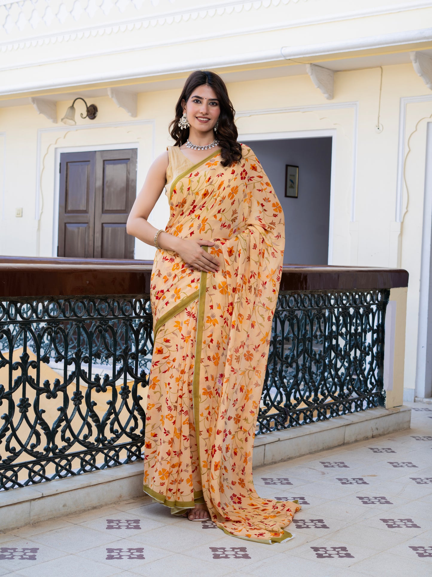 Autumn: Light Peach Chiffon Printed Saree With Green Border