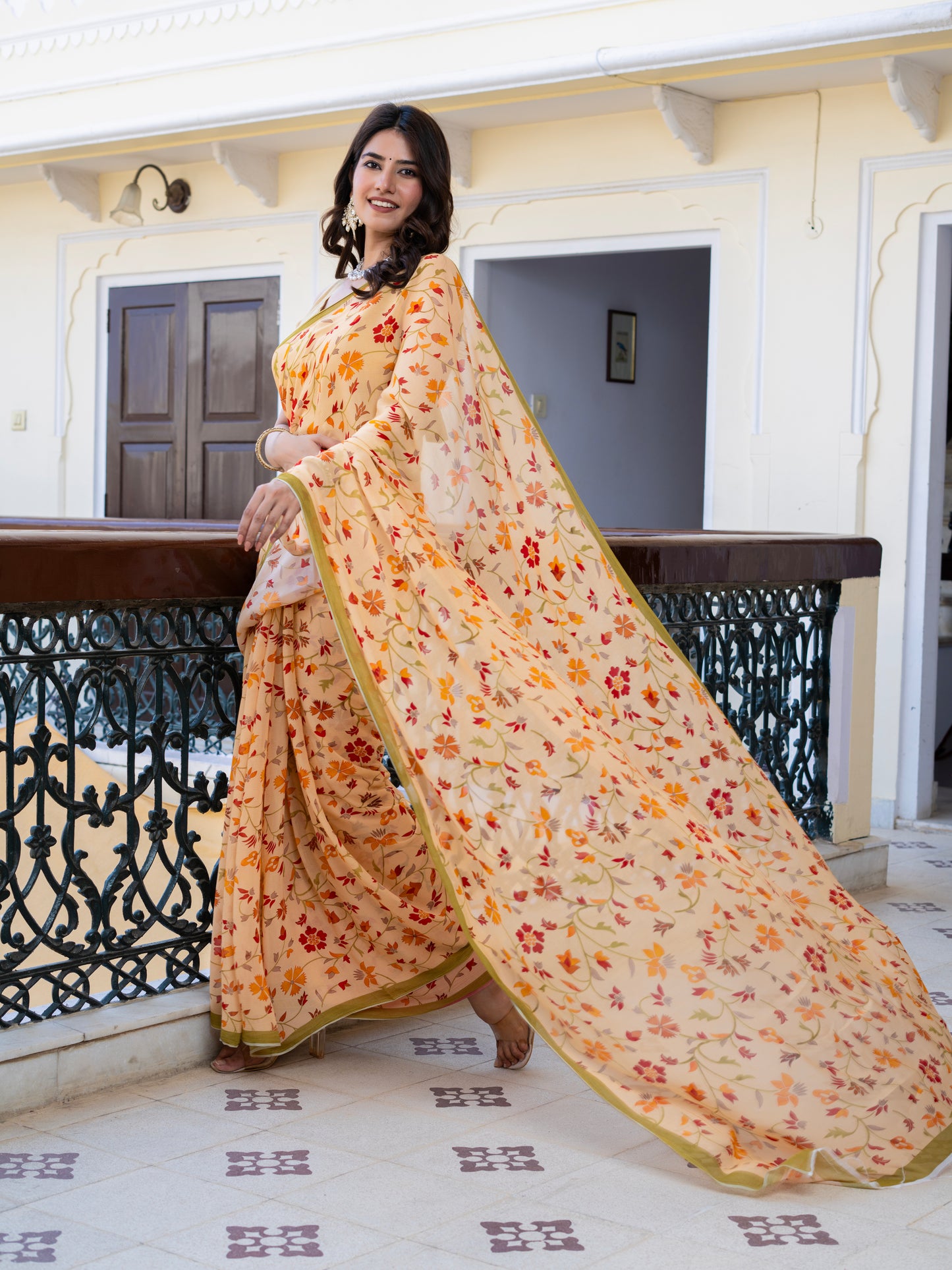 Autumn: Light Peach Chiffon Printed Saree With Green Border