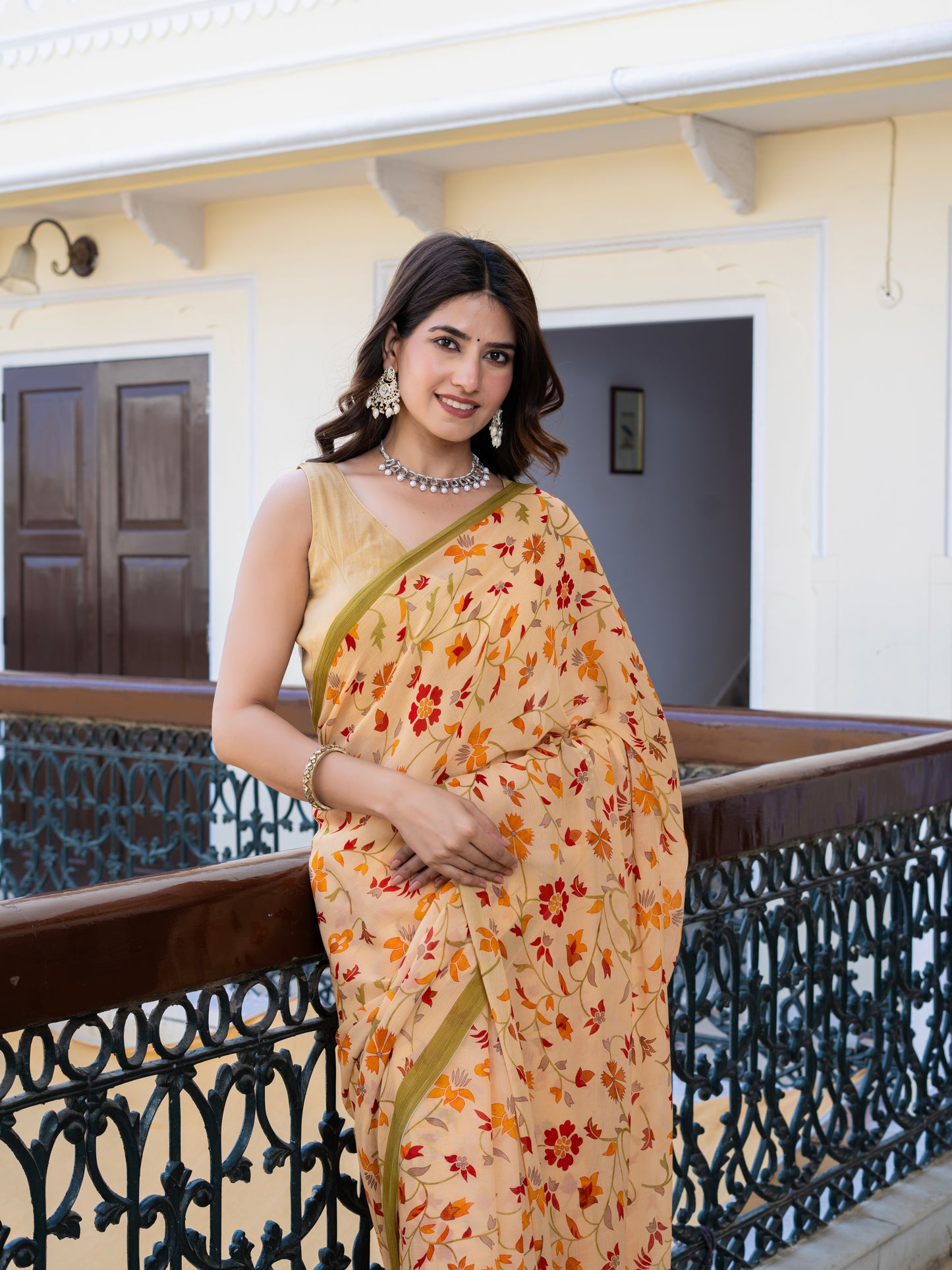Autumn: Light Peach Chiffon Printed Saree With Green Border
